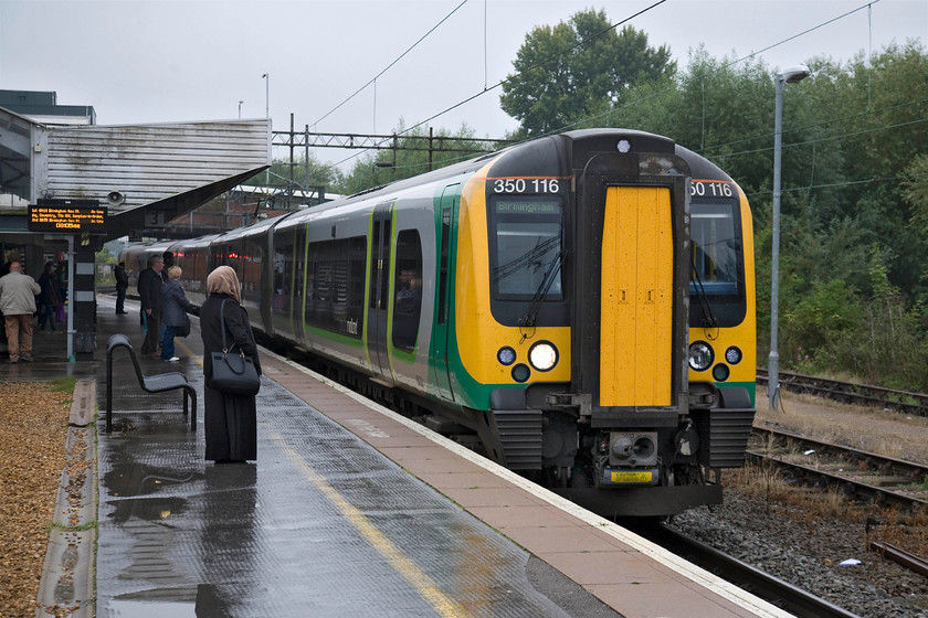 350116, LM 07.54 London Euston-Birmingham New Street (2Y17), Northampton station 
 My work-related journey from Northampton to Narborough was undertaken in three legs. The first leg was from Northampton to Rugby courtesy of 350116 seen here arriving at my starting point. The London Midland Desiro was working the 07.54 Euston to Birmingham New Street. 
 Keywords: 350116 07.54 London Euston-Birmingham New Street 2Y17 Northampton station London Midland Desiro