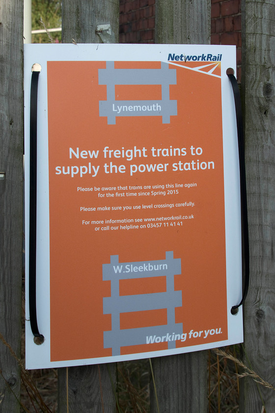 NR notice, Marchey s House crossing 
 There were a number of these laminated notices at various locations such as railway crossing points in the area around Ashington and Blyth. The message is clear, after a long period of inactivity, the railway is in use again. However, rather than trains going to the Alcan aluminum smelter, that has now closed, they are taking biomass to the adjacent power station. However, there are also serious discussions taking place about re-introducing passenger services to the network of lines in this area so train numbers would increase again. 
 Keywords: NR notice Marchey's House crossing