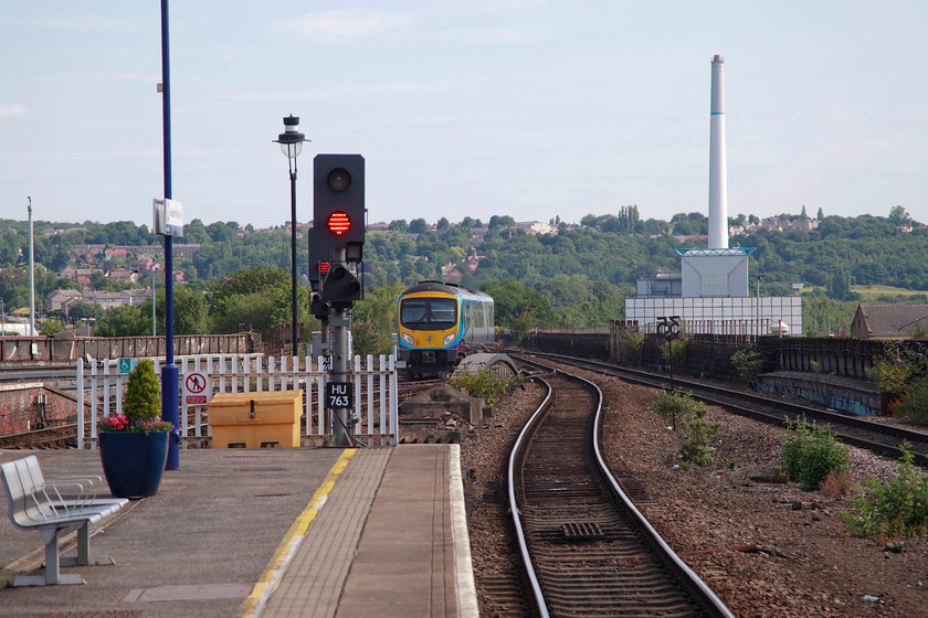 185139, TP 08.22 Liverpool Lime Street-Scarborough (1E65, 1L), Huddersfield station 
 Having made the journey from Manchester Piccadilly to Huddersfield, I have alighted just in time to capture 185139 leaving the station. It is working the 08.22 Liverpool Lime Street to Scarborough and is about to cross Huddersfield Viaduct and pass the town's new Kirklees waste incinerator plant that dominates the scene 
 Keywords: 185139 1E65 Huddersfield station