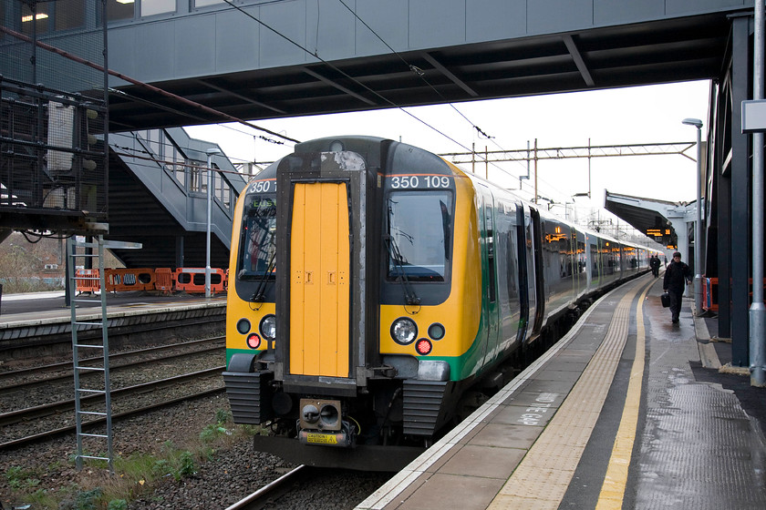 350109, LM 08.33 Birmingham New Street-London Euston (1W06), Northampton station 
 It just does not seem right when going north to somewhere such as Bolton, that I go south from Northampton! However, the most cost effective and quickest way to do the journey is to go south to Milton Keynes to then go north again. 350109 waits at Northampton station forming the 08.33 Birmingham New Street to Euston that I took as far as Milton Keynes. 
 Keywords: 350109 08.33 Birmingham New Street-London Euston 1W06 Northampton station