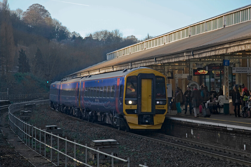 158958, GW 10.50 Great Malvern-Brighton (1O98), Bath Spa station 
 One of First Great Western's six Express Sprinter hybrid units where one end coach is a driving coach from another unit of the same class has been tagged on to a two-car unit arrives at Bath station. 158958 is working the 10.50 Great Malvern to Brighton 1O98 service that takes an incredibly winding and circuitous route from Worcestershire to East Sussex. 
 Keywords: 158958 10.50 Great Malvern-Brighton 1O98 Bath Spa station First Great Western