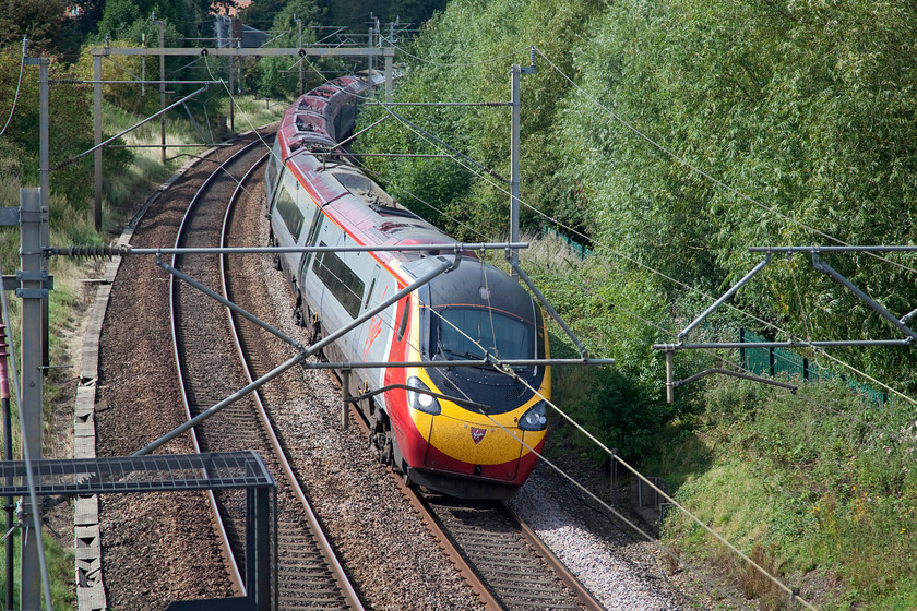 390044, VT 13.47 Liverpool Lime Street-London Euston (1A40, 15L), Weedon SP635589 
 390044 takes the curves at Weedon with the 13.47 Liverpool Lime Street to Euston. 
 Keywords: 390044 1A40 Weedon SP635589