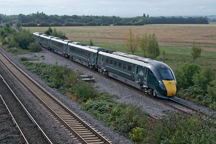 800011, GW 08.50 London Paddington-Great Malvern (cancelled from Worcester Foregate Street, 1W17, 45L), Godstow bridge 
 Was the slow speed of the 08.50 Paddington to Great Malvern passing Gostow bridge north of Oxford a portent of things to come on its journey ahead? Its progress along the Cotswold line did not get any better to the point when it arrived in Worcester some forty-five minutes late it was promptly cancelled. I don't think that there was a problem with IET 800011 as we saw it later in the day heading back towards London. 
 Keywords: 800011 GWR 08.50 London Paddington-Great Malvern 1W17 Godstow bridge Great Western Railway