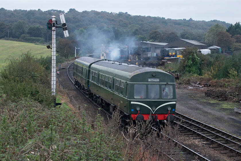 E56062 & E51188, Weybourne-Sheringham ECS, Weybourne 
 Making a smokey departure from Weybourne resident Class 101 DMU heads towards Sheringham in preparation to work the first service train of the day on the North Norfolk Railway. E56062 and E51188 are passing one of a number of somersault signals on the line that are totally in keeping with its former Midland & Great Northern Railway and Midland and Great Northern Joint Railway heritage. 
 Keywords: E56062 E51188, Weybourne-Sheringham ECS Weybourne Class 101 DMU