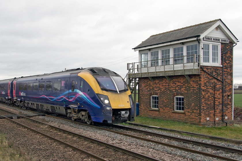 180109, HT 09.49 London Kings Cross-Hull (1H02, 2E), Three Horse Shoes 
 Not the greatest of compositions but it shows off Three Horse Shoes signal box better that the class 180! 180109 passes the remote Fenland 1846 signal box with the 09.49 London King's Cross to Hull. It's an odd name for this particular signal box as it's located in the village of Turves. Studying the OS map reveals no reference to anything relating to the name of the actual box. 
 Keywords: 180109 09.49 London Kings Cross-Hull 1H02 Three Horse Shoes