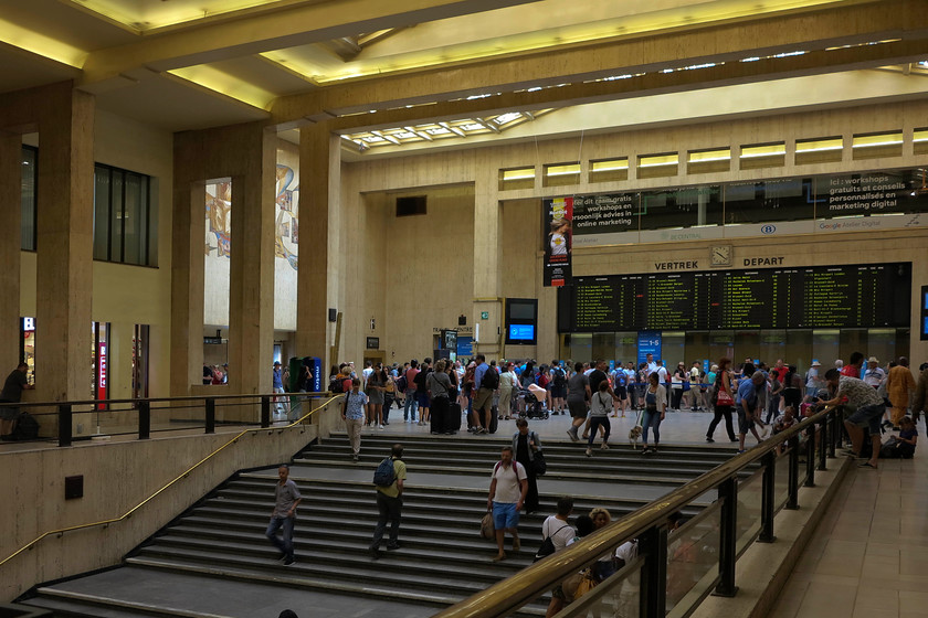 Concourse, Brussels Centraal station 
 The concourse of Brussels Centraal station. It is a vast station that is the second busiest on the Belgium network. The station took some forty years to build as work was interrupted by two world wars and economic austerity. Its modernist styling was created by Victor Horta and latterly Maxime Brunfaut. 
 Keywords: Concourse Brussels Centraal station