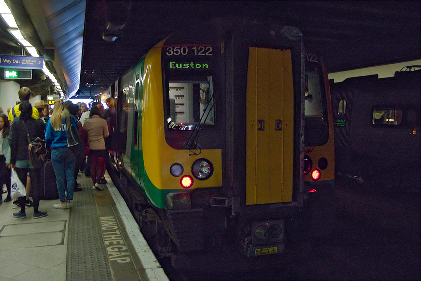 350122, LM 07.37 Northampton-Birmingham New Street (2Y05), Birmingham New Street station 
 Such is the intensive use of London Midland Desiros that as soon as one arrives at New Street and the passengers alight, the waiting customers are clamouring to get aboard for its next service. I have just alighted from 350122 having travelled on it as the 07.37 from Northampton. It will return south to Euston within a few minutes of its arrival. 
 Keywords: 350122 07.37 Northampton-Birmingham New Street 2Y05 Birmingham New Street station London Midland Desiro