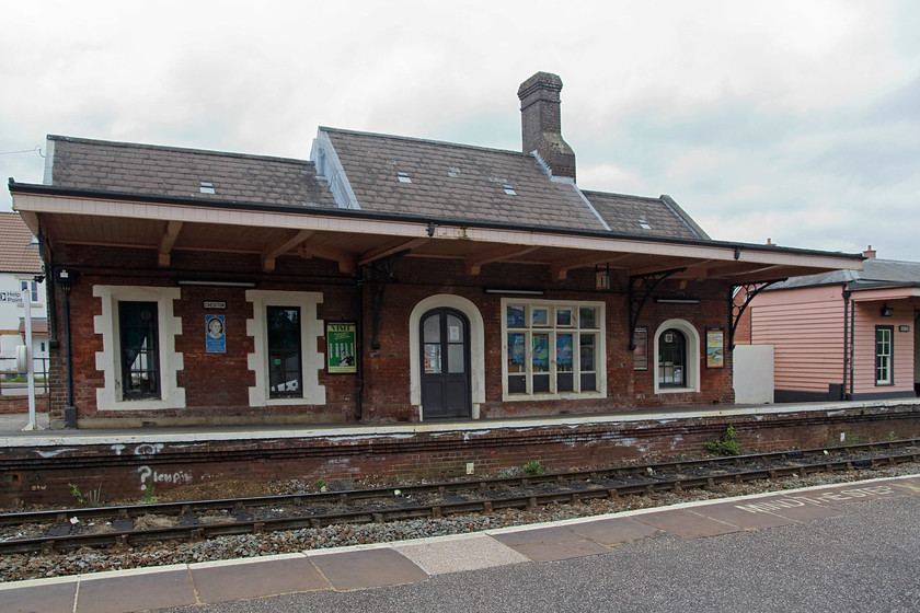 Crediton station 
 The delightful Crediton station building. The station contains a 'highly commended' station cafe as awarded by The Guardian in 2009 and model railway of the area. Unfortunately, it was not yet open so Andy and I could not sample its delights so we had to make do with a nearby Tesco that did us an excellent value breakfast! 
 Keywords: Crediton station