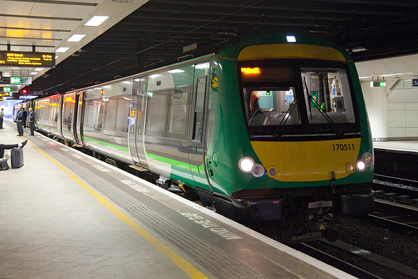 170511, LM 07.57 Birmingham New Street-Walsall (2A05), Birmingham New Street station 
 During peak times, London Midland does not have enough electric units to cover all its services so it has to call in some diesels to work under the wires. Here, 170511 has just arrived at New Street with the 2A05 07.57 from Walsall. 
 Keywords: 170511 07.57 Birmingham New Street-Walsall 2A05 Birmingham New Street station