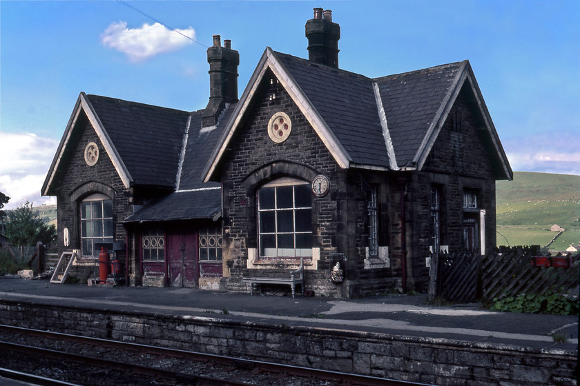 Horton in Ribblesdale Station (Closed 1970, reopened 1986) 
 With the platform clock reading six-thirty Horton in Ribblesdale station looks a little run down and in a rather parlous state. At this time, that station had been closed for ten years and was derelict. However, happier times lay ahead with the station reopening in 1986 and the building being converted into a private residence. The owners have renovated the building in a sympathetic style with it maintaining its original features including, at my last visit in 2014, a working clock, see...... https://www.ontheupfast.com/p/21936chg/30016458779/x16-horton-ribblesdale-station 
 Keywords: Horton in Ribblesdale Station Midland Railway