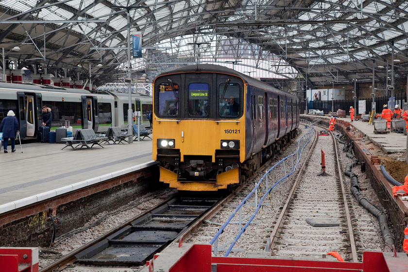 150121, NT 09.44 Manchester Oxford Road-Liverpool Lime Street (2O77, 5L), Liverpool Lime Street station 
 Former First Great Western unit, 150121 arrives into Liverpool Lime Street with the 2O77 09.44 from Manchester Oxford Road. The remodelling of Lime Street station is much in evidence on the right hand side of this picture. 
 Keywords: 150121 2O77 Liverpool Lime Street station