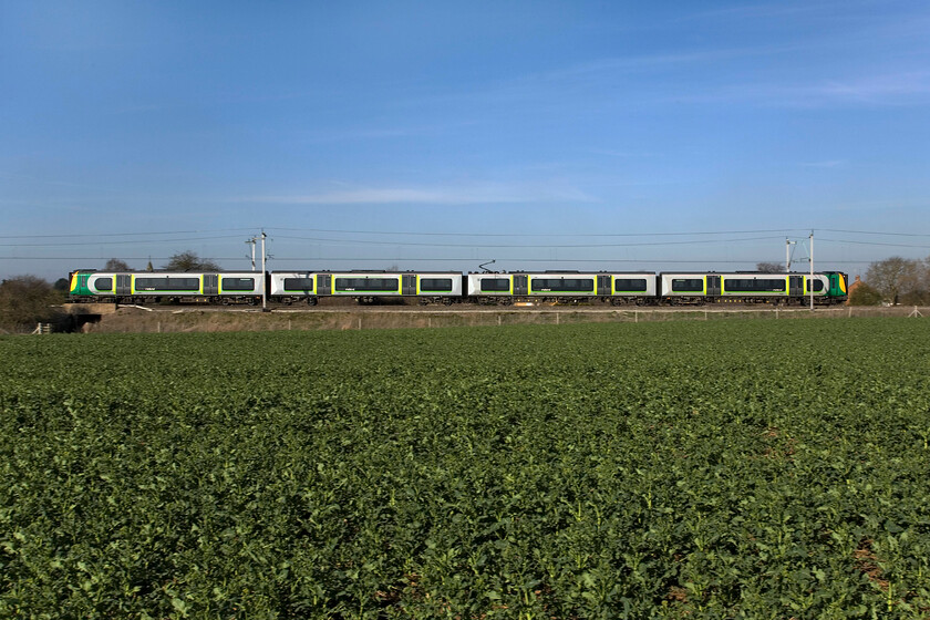 Class 350, LM 07.54 London Euston-Birmingham New Street, Milton Malsor SP740558 
 Using a much wider angle than adopted in the previous photographs brings another dimension to this bucolic scene in the fields near the Northamptonshire village of Milton Malsor. An unidentified London Midland Desiro passes working the 07.54 Euston to Birmingham New Street service. If it had been a two-set train my efforts to capture the train successfully would not have worked! 
 Keywords: Class 350 07.54 London Euston-Birmingham New Street Milton Malsor SP740558 London Midland desiro