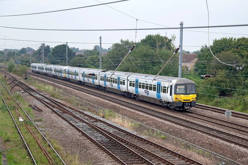 365539 & 365510, GN 09.19 Peterborough-London Kings Cross (1P13, 1L), Biggleswade Grasmere Road footbridge 
 Taken from a large bridge just off Grasmere Road in Huntingdon, 365539 and 365510 head south having just left the station with the 09.19 Peterborough to London King's Cross. 
 Keywords: 365539 365510 1P13 Biggleswade Grasmere Road footbridge