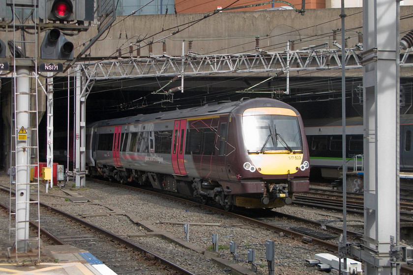 170523, XC 16.09 Birmingham New Street-Leicester (1K23), Birmingham New Street station 
 Catching an unfortunate reflection from the April sunshine, 170523 leaves Birmingham New Street forming the 16.09 to Leicester. The livery carried by this Turbostar, and all other CrossCountry trains is an interesting one, I have never been able to decide if I like it or not, one thing I'm not keen on is the random quadrilaterals as seen here on the carriage ends. 
 Keywords: 170523 16.09 Birmingham New Street-Leicester 1K23 Birmingham New Street station Cross Country Turbostar