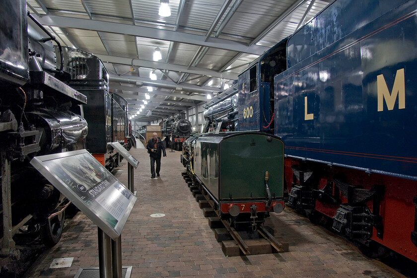 Andy, 80079, 47383, 46443 & 600, on display, Highley Engine House 
 With some twenty minutes in hand and with it absolutely teaming with rain Andy and I decided to take shelter in the superb Higley Engine House museum. Unfortunately, this was not enough time to explore this excellent SVR attraction that was full of interesting locomotives and artefacts. In this view, the gargantuan proportions of the former Longmoor Military Railway 2-10-0 War Department 600 'Gordon' dominates the scene. Somewhat dwarfed is 4MT 80079, LMS 3F 47383 and in the background is Ivatt Class 2 number 64443. It's a shame that we had so little time to explore the museum further as it really did look to be a fantastic new addition to the line's attractions. 
 Keywords: Andy 80079 47383 46443 & 600 Highley Engine House Longmoor Military Railway LMR