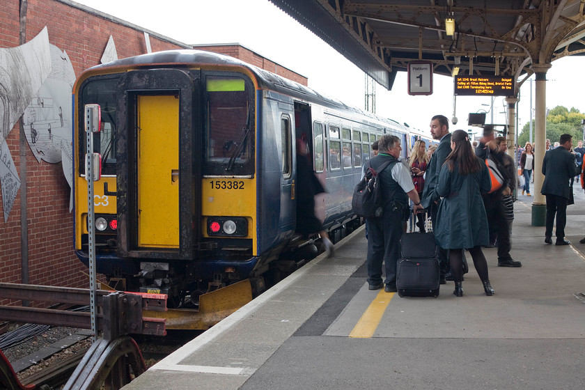 153382 & 158958, GW 09.00 Brighton-Great Malvern (1V94), Bristol Temple Meads station 
 A very busy scene on Bristol Temple Meads' platform three as 158382 coupled to 158958 pauses and make ready to reverse back out again working the 09.00 Brighton to Great Malvern train. I really do think that the travelling public should be given a better railway experience that making this cross-country journey in a single-car class 153. If they could get a seat in the adjoined class 158 then the journey would be marginally better I suppose! 
 Keywords: 153382 158958 09.00 Brighton-Great Malvern 1V94 Bristol Temple Meads station