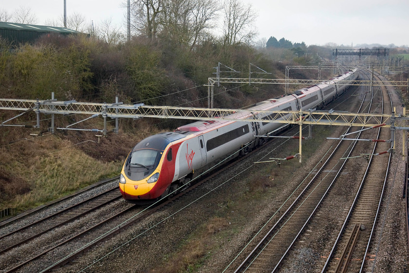 Class 390, VT 11.47 Wolverhampton-London Euston (1B18), Victoria bridge 
 An unidentified class 390 passes Victoria bridge south of Roade in Northamptonshire with the 11.47 Wolverhampton to London Euston service. 
 Keywords: Class 390 11.47 Wolverhampton-London Euston 1B18 Victoria bridge