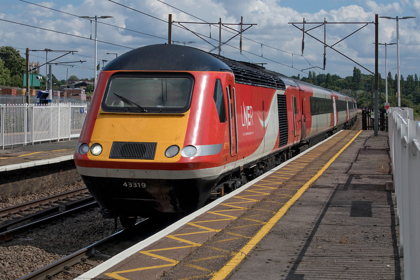 43319, GR 15.00 London King`s Cross-Stirling (1W22, 6L), New Southgate station 
 43319 leads the 15.00 King's Cross to Stirling just six miles into its 415-mile journey as it passes through New Southgate station. At the risk of simply repeating what I have said before, I think that the ex Virgin East Coast livery with LNER branding is very smart and a fitting way for the these ECML stalwarts to bow out as they will over the coming few months. 
 Keywords: 43319 15.00 London King`s Cross-Stirling 1W22 New Southgate station