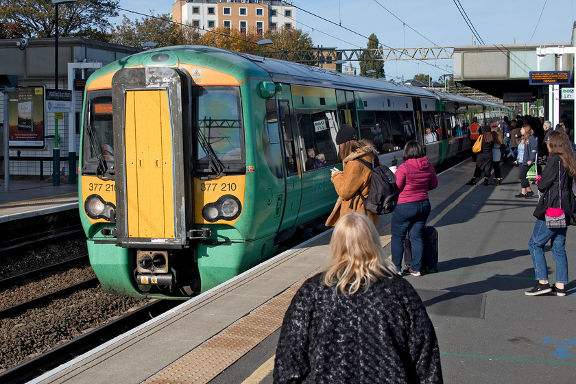 377210, SN 10.12 Milton Keynes Central-East Croydon (2O31, 4L), Watford Junction station 
 My wife and I were relieved to get our connection at Watford Junction having arrived late from Northampton. As we were so late, we did not have to wait long for Southern's 377210 to arrive and were pleased to get a seat around a table. I knew that we would get the connection as we overtook the 10.12 Milton Keynes central to East Croydon working as it made its way along the up slow between Leighton Buzzard and Tring. We took this train as far as Kensington Olympia. My wife commented on how smooth, quiet and clean the Eloctrostar was compared to our own 350 Desros that are looking somewhat tired now. 
 Keywords: 377210 10.12 Milton Keynes Central-East Croydon 2O31 Watford Junction station