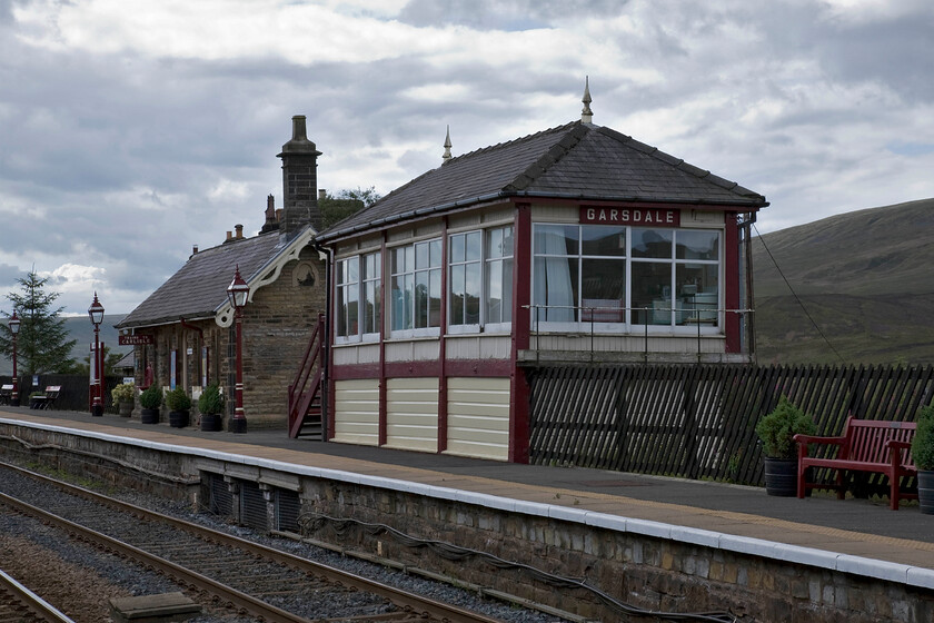 Garsdale signal box & station (Mid, 1908) 
 Garsdale station is located very close to the summit of the Settle and Carlisle route being at an altitude of just over one thousand one hundred feet above sea level. It must have represented real solace for train crews to reach this remote outpost as it offered a place of safety in the form of sidings and loops if a locomotive or train had run into difficulties climbing either side of the 'Long Drag'. The 1908 Midland signal box occupies this dominant position on the down platform and looks particularly well kept as does this station in general. 
 Keywords: Garsdale signal box station 1908 Midland Railway