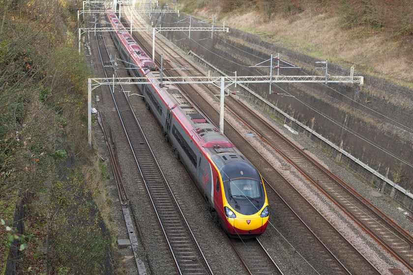 390155, VT 10.15 Manchester Piccadilly-London Euston (1A24), Roade Cutting 
 390155 'X-Men: Days of Future Past' passes through Roade Cutting working the 10.15 Manchester Piccadilly to London Euston. 
 Keywords: 390155 10.15 Manchester Piccadilly-London Euston 1A24 Roade Cutting