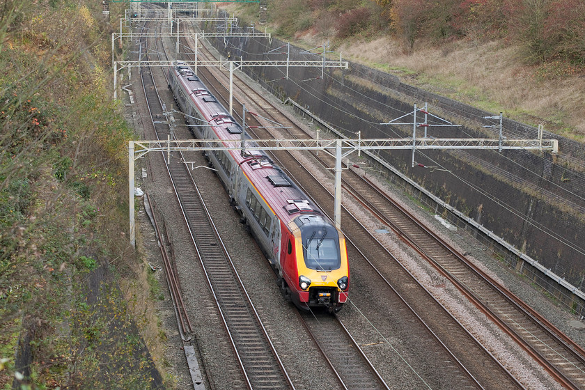 Class 221, VT 08.55 Holyhead-London Euston (9M50), Roade cutting 
 A Virgin class 221 heads south through Roade cutting with the 08.55 Holyhead to Euston working. This is an interesting journey and one that I have never made in its entirety. However, I hope that Andy and I will have the opportunity to do it one day, but I would prefer it was not on a Voyager! 
 Keywords: Class 221 08.55 Holyhead-London Euston 9M50 Roade cutting