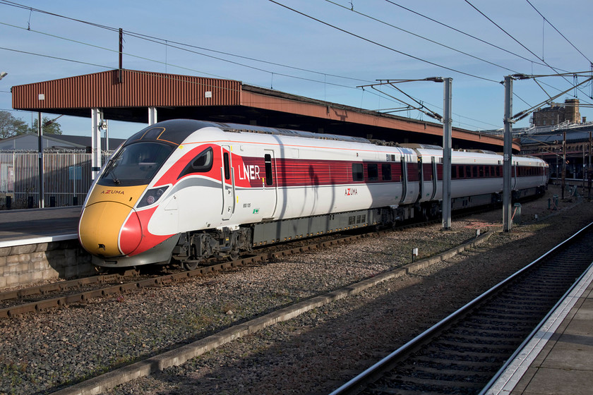 800105, VT 10.02 York-London King`s Cross (1Y82, 1L), York station 
 In lovely late autumn sunshine, a nice new and shiny Azuma waits at York station. 800105 will soon form and work the 10.02 from York to King's Cross. I must say that the livery applied to the LNER operated class 800s is infinitely better than the drab green applied to Great Western's units. 
 Keywords: 800105 10.02 York-London King`s Cross 1Y82 York station azuma