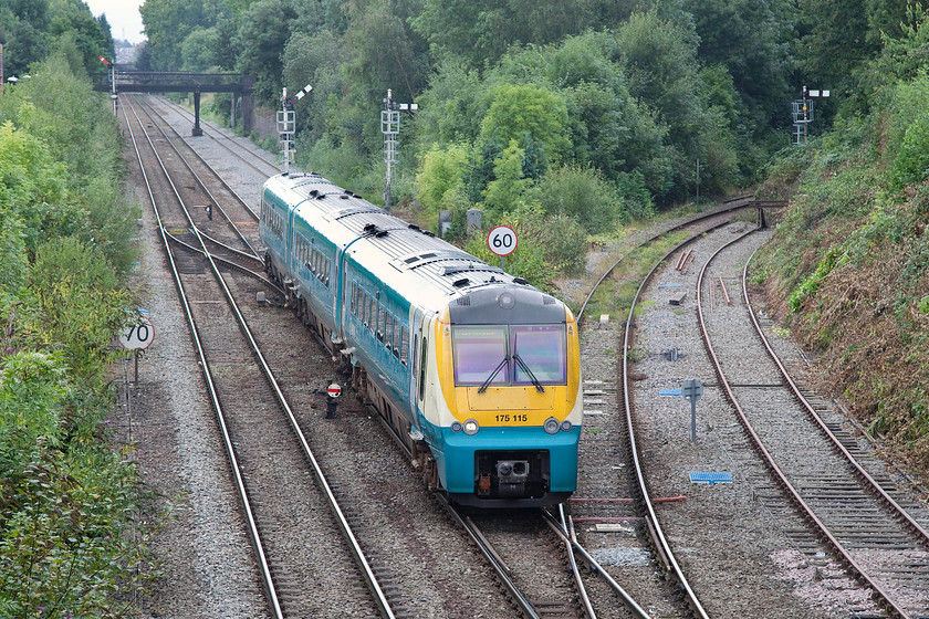 175115, AW 11.21 Cardiff Central-Holyhead (1W93), Sutton Bridge Junction 
 175115 approaches Shrewsbury from the south at Sutton Bridge Junction forming the 11.21 Cardiff Central to Holyhead service. Even though this scene looks rural, it is in fact far from it being in the suburbs of Shrewsbury and distinctly urban. There ar a superb collection of semaphores here four of which are on view. The line off to the right is the Welshpool line that extends to the Welsh coast. 
 Keywords: 175115 11.21 Cardiff Central-Holyhead 1W93 Sutton Bridge Junction