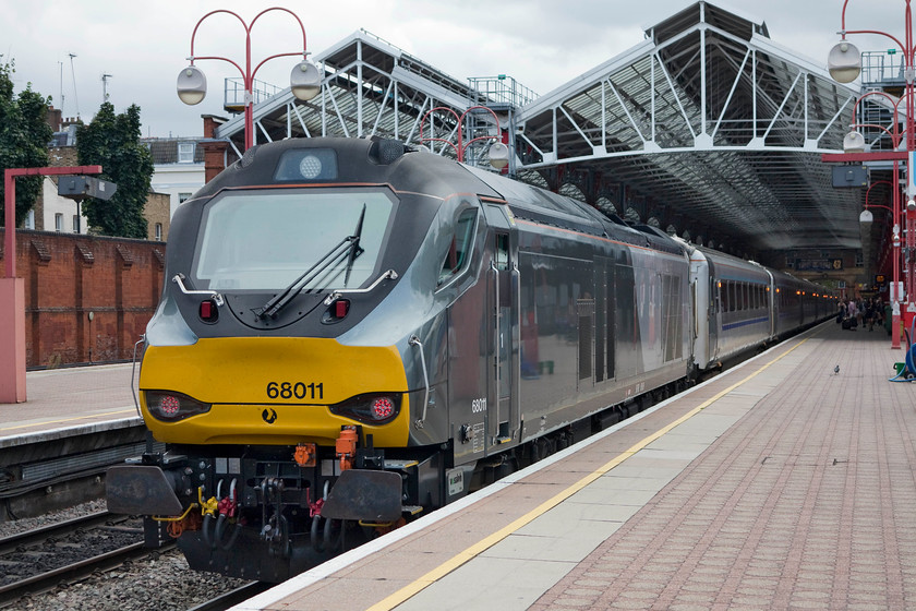 68011, CH 13.10 London Marylebone-Birmingham Moor Street (1R33, 17L), London Marylebone station 
 Looking very smart in its Chiltern Mainline livery 68011 waits at Marylebone to work the 13.10 to Birmingham Moor Street. This is a comfortable way to make the hour and half journey between central London and central Birmingham. I am pleased that Chiltern have stuck with the locomotive hauled model for some of their trains and in 2018 it is an idea that other TOCs have shown that they are interested in returning to. 
 Keywords: 68011 1R33 London Marylebone station