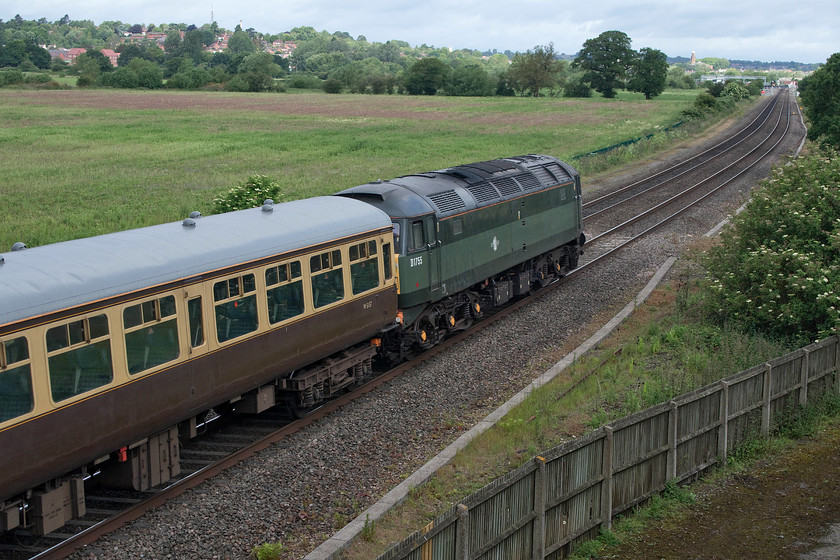 D1755, outward leg of the Oxford 175 Express, 06.53 Solihull-Oxford (1Z70), Warkworth SP476394 
 D1755, at the rear of the Oxford 175 Express, passes a spot on the M40 motorway embankment near to Warkworth south of Banbury. I am led to believe that this railtour proved popular due to the fact that the class 47 was not going to be on the rear of the train for the second part of the day. However, passengers were to be disappointed is it remained on the back of the train for the whole day. In April 1984, I had haulage behind D1755, then as 47541 'The Queen Mother', on the 23.50 Inverness to Glasgow Queen Street sleeper. 
 Keywords: D1755 Oxford 175 Express 06.53 Solihull-Oxford 1Z70 Warkworth SP476394