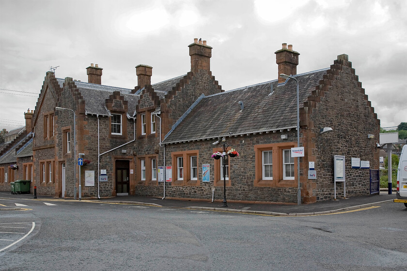 Frontage, Lockerbie station 
 At seventy-five miles south of Glasgow Central Lockerbie station was opened in1847 by the Caledonian Railway as it headed northwards from Calisle as it continued its efforts to reach the aforementioned Glasgow. The substantial stone-built station building is in a typical style for the Caledonian Railway. 
 Keywords: Frontage Lockerbie station