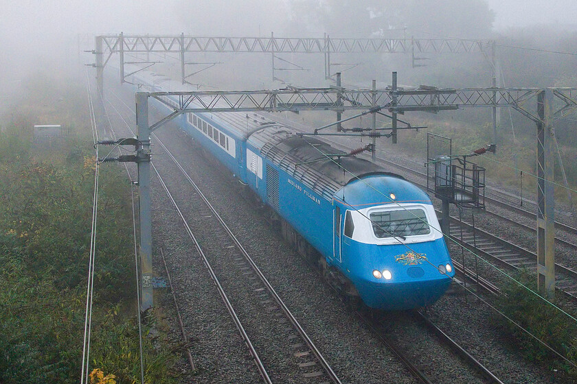 43055 & 43081, outward leg of the Settle to Carlisle & Coastal Pullman, 07.11 Watford Junction-Carlisle (1Z53, 5E), site of Roade station 
 For the second Friday on the trot I have managed a photograph of an LSL Blue Pullman charter. Last week's was in considerably better weather than today, see..... https://www.ontheupfast.com/p/21936chg/30061034238/x43058-43050-outward-leg-west-highland In this photograph, 43055 leads the Settle to Carlisle Coastal Pullman charter that left Watford Junction at 07.11. Out of sight through the murk 43081 brings up the rear. 
 Keywords: 43055 43081 Settle to Carlisle & Coastal Pullman 07.11 Watford Junction-Carlisle 1Z53 site of Roade station Blue Pullman LSL Locomotive Services Ltd