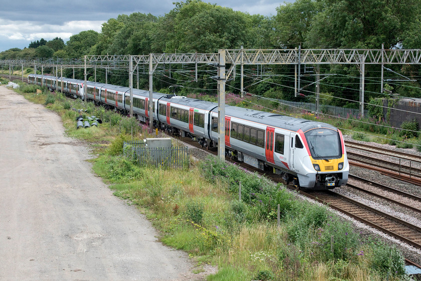 720538 & 720537, 12.38 Rugby-Wolverton centre sidings (5Q28, 7L), site of Roade station 
 As is now the norm the Bombardier built Class 720s destined for use with Greater Anglia are massively delayed for a whole host of reasons. The COVID-19 pandemic has slowed things even further but the units are now on mileage accumulation runs prior to heading to Essex and the northeast London area. On the second day of these runs, 720538 and 720537 head past Roade as the 12.38 Derby to Wolverton Works 5Q28. This short trip is part of a much longer round trip that involves going to Crewe and further south towards London. I think that these units look smart but very similar to so many others that have entered service or are about to, making them a little anonymous. 
 Keywords: 720538 720537 12.38 Rugby-Wolverton centre sidings 5Q28 site of Roade station Greater Anglia GA Bombardier