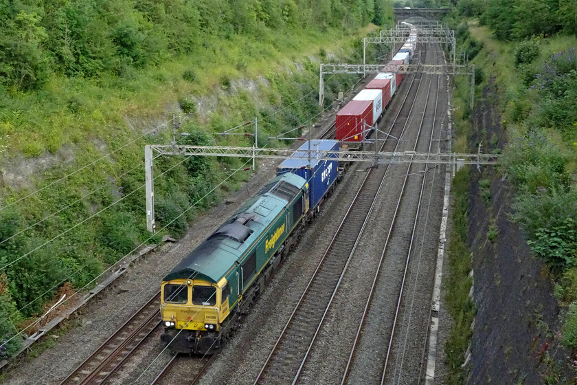 66588, 13.13 Felixstowe North-Lawley Street (4M93, 14E), Roade cutting 
 The 13.13 Felixstowe North to Lawey Street passes through Roade cutting led by Freightliner's 66588. I have a number of photographs of this locomotives the furthest from home in Northamptonshire was in the north east, see... https://www.ontheupfast.com/p/21936chg/25690215204/x66588-10-27-leeds-flt-tees-dock 
 Keywords: 66588 13.13 Felixstowe North-Lawley Street 4M93 Roade cutting Freightliner