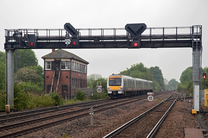 168215, CH 07.40 London Marylebone-Oxford (1T10, 3L), Princes Risborough station 
 168215 passes the ex. GWR Pinces Risborough signal box working the 07.40 Marylebone to Oxford. This signal box is grade II listed and has been in various states of repair for a number of years since its closure by BR in 1991. There is now a concerted effort to refurbish it by volunteers of the adjacent Chinnor and Princes Risborough Railway as it will form part of their extension plans into Princes Risborough station. 
 Keywords: 68215 1T10 Princes Risborough station