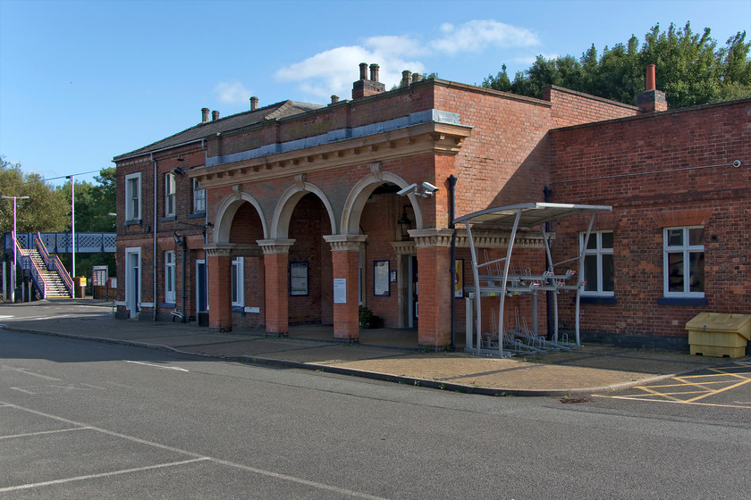 Frontage, Melton Mowbray station 
 The attractive frontage of Melton Mowbray station with its three distinctive arches. The station used to be named Melton Mowbray Town so as not to be confused with Melton Mowbray North on the Great Northern and London and North Western Joint Railway, which closed to regular traffic in 1953. 
 Keywords: Frontage Melton Mowbray station