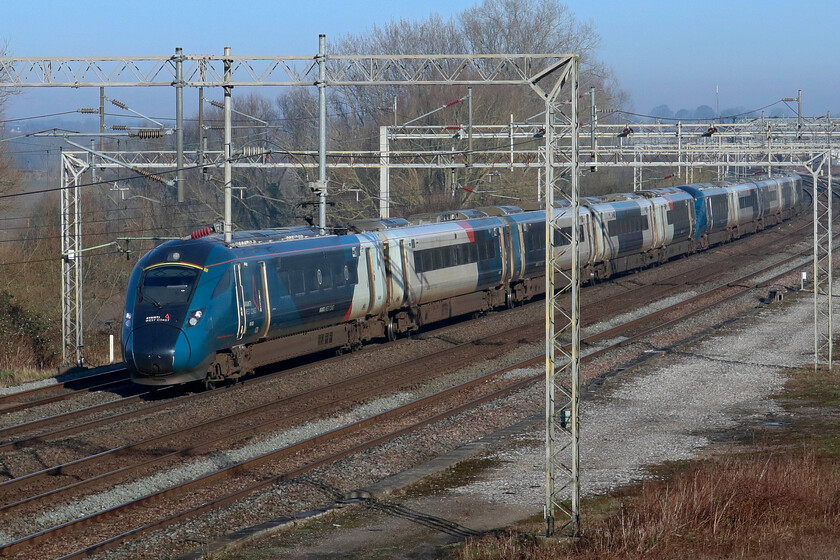 805005 & 805008, VT 07.03 Wrexham General-London Euston (1A16, 3L), Gordon's Lodge 
 Everos 805005 and 805008 pass Gordon's Lodge just north of the busy Hanslope Junction working the 07.03 Wrexham General to Euston Avanti service. On such a beautiful and superb morning for railway photography, the only thing that is not quite perfect is the colour of the train. 
 Keywords: 805005 805008 07.03 Wrexham General-London Euston 1A16 Gordon's Lodge AWC Avanti West Coast Evero