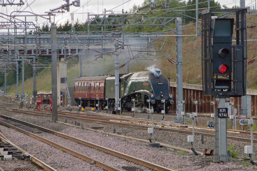 60009, 15.40 Crewe-Southall WCR (5V42), Milton Keynes station 
 60009 'Union of South Africa' works south through Milton Keynes Central in steam and towing just a support coach. It was working the 15.40 5V42 Crewe to West Coast's Southall facility. Notice that the hutter has been pressed as the chime whistle is just being blown! 
 Keywords: 60009 15.40 Crewe-Southall WCR 5V42 Milton Keynes station