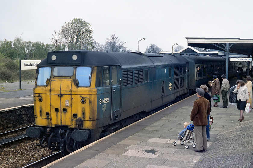 31422, unidentified Bristol Temple Meads-Portsmouth Harbour working, Trowbridge station 
 31422 arrives at a relatively busy Trowbridge station with an unidentified Bristol to Portsmouth Harbour working. This was the train that I took the short distance to Westbury with my friend Guy, who is seen leaning out of the first coach window. I am not sure why I took the train from Trowbridge rather than from my 'home station' of Bradford-on-Avon? This scene shows some of the original station at Trowbridge. all of which was demolished and re-built in the late 1980s 
 Keywords: 31422 Bristol Temple Meads-Portsmouth Harbour working Trowbridge station