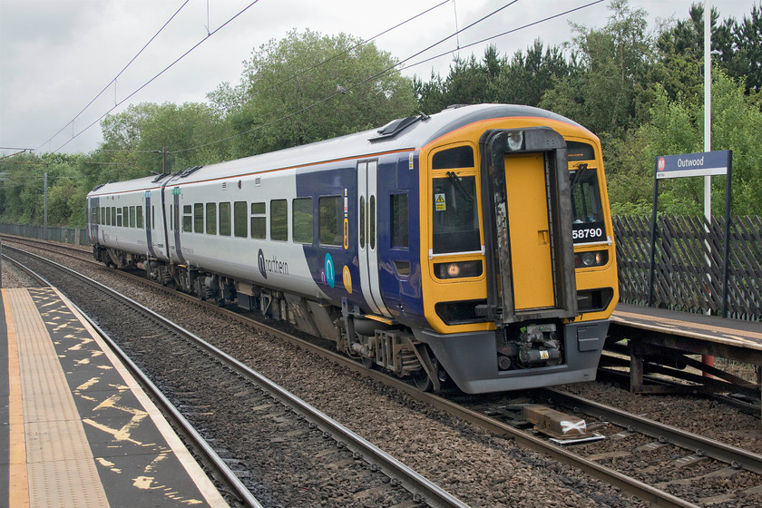 158790, NT 10.48 Leeds-Sheffield (2N10, RT), Outwood station 
 158790 slows for its stop at Outwood station forming the 10.48 Leeds to Sheffield. With many seats in the train taped off and out of use to enable social distancing it had no more than half a dozen passengers on-board. 
 Keywords: 158790 10.48 Leeds-Sheffield 2N10 Outwood station Northern