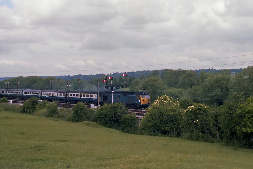 50022, unidentified up working, Hungerford SU345682 
 50022 'Anson' heads an unidentified up express past Hungerford's down bracket signal post. The picture is taken from an area to the east of the Berkshire town called Hungerford Common. 
 Keywords: 50022, unidentified up working, Hungerford SU345682