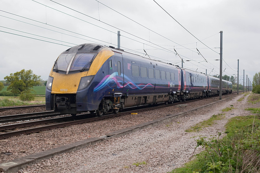 180109, HT 10.31 Hull-London Kings Cross (1A95, RT), White House Crossing TL227777 
 Hull Trains (part of First Group) is an open access operator on the ECML. It uses a fleet of four class 180 Adelante DMUs. Here, 180109 heads past White House Crossing near Abbots Ripton working the 10.31 Hull to King's Cross. These class 180s are fast and now reliable units that use Voith hydraulic transmission to transmit the power from their Cummins QSK19 engines to the axles. 
 Keywords: 180109 1A95 White House Crossing TL227777