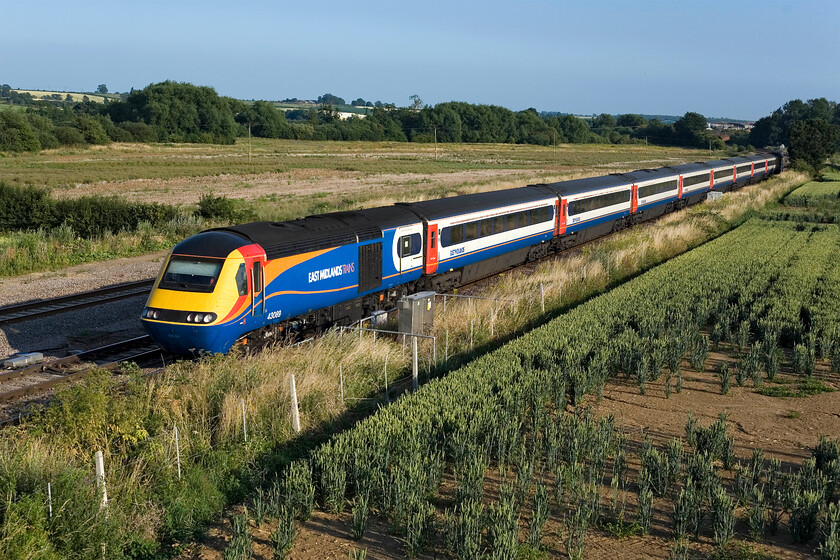 43089, EM 18.15 London St. Pancras-Leeds, Harrowden Junction 
 HST power car 43089 leads the 18.15 St. Pancras to Leeds service past Harroden Junction in some superb summer evening light. Like the Melton Mowbray service photographed a little earlier, this is a one-off service with a corresponding up working early in the morning from Leeds. It is used by EMT to get an HST to Leeds' Neville Hill depot for servicing and any necessary exams. 
 Keywords: 43089 18.15 London St. Pancras-Leeds Harrowden Junction EMT East Midlands Trains HST