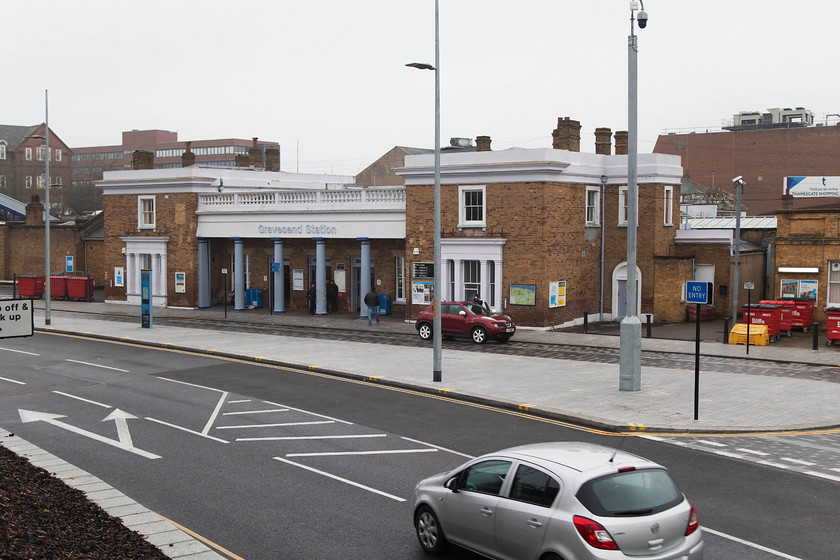 Frontage, Gravesend station 
 We were pleased to see throughout or day that Southeastern have been spending some money renovating many of their stations. A good example of the work that they have undertaken is here at Gravesend. It was designed by the architect Samuel Beazley who did a lot of work for the South Eastern Railway. It's an elegant two-storey building constructed out of the SER's favoured yellow brickwork and is frescoed with stone lining. The 19million restoration completed in 2104 is very good apart from the ghastly footbridge but this, like all the others installed, has had to be designed to facilitate disabled access. 
 Keywords: Frontage, Gravesend station