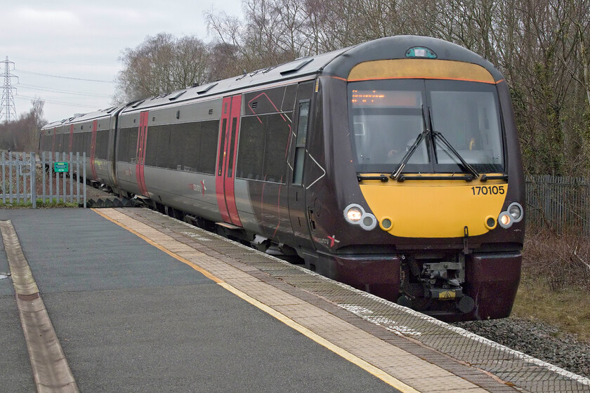 170105, XC 06.40 Cardiff Central-Nottingham (1M00, RT), Water Orton station 
 170105 passes through Water Orton station working the 06.40 Cardiff Central to Nottingham CrossCountry service. These Turbostars have become a familiar sight throughout central England with them crisscrossing on various routes. This example is one of ten three-car units in the 170/1 sub-class operated by CrossCountry. 
 Keywords: 170105 06.40 Cardiff Central-Nottingham 1M00 Water Orton station CrossCountry Turbostar