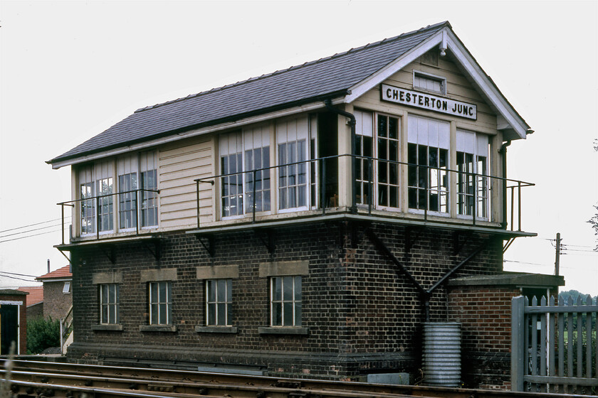 Chesterton Junction signal box (LNER, 1931) 
 Chesterton signal box was once located in almost open countryside to the north of Cambridge adjacent to the tranquil River Cam. The 1931 LNER box is seen here taken from the level crossing that it controlled via a large wheel. It was located at the point where the St. Ives branch diverged westwards from the Ely/Kings Lyn mainline. Most of the trackbed of the St. Ives branch is now part of the infamous guided busway that opened in 2011. The box closed in November 1985 when the route between here and Ely came under the control of the Cambridge PSB. Today, the location is highly urbanised being part of north Cambridge with the citys new Science Park (North) station being located a short distance north (over my right shoulder) from here; a very different scene than when the box first opened! 
 Keywords: Chesterton Junction signal box LNER London and North Eastern Railway