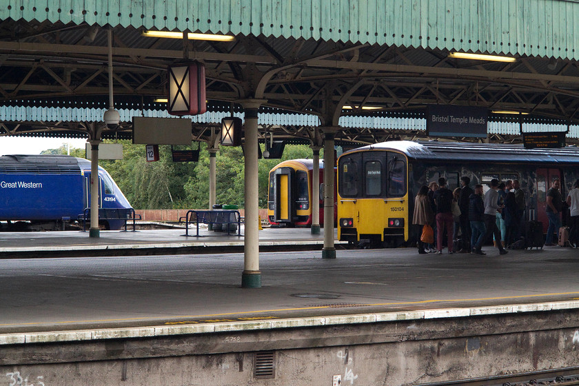 43194, GW 15.32 Bristol Temple Meads-London Paddington, 159010, stabled & 150104, GW 15.26 Bristol Temple Meads-Weston-super-Mare (2Y22), Bristol Temple Meads station 
 A scene looking through the platforms on the eastern side of Temple Meads station. 43194 is at the rear of the 15.32 departure to London Paddington. South West Trains' 159010 is stabled between duties whilst passengers are boarding 150104 that will soon leave as the 2Y22 15.26 to Weston-super-Mare. 
 Keywords: 43194 15.32 Bristol Temple Meads-London Paddington 159010 150104 15.26 Bristol Temple Meads-Weston-super-Mare 2Y22, Bristol Temple Meads station