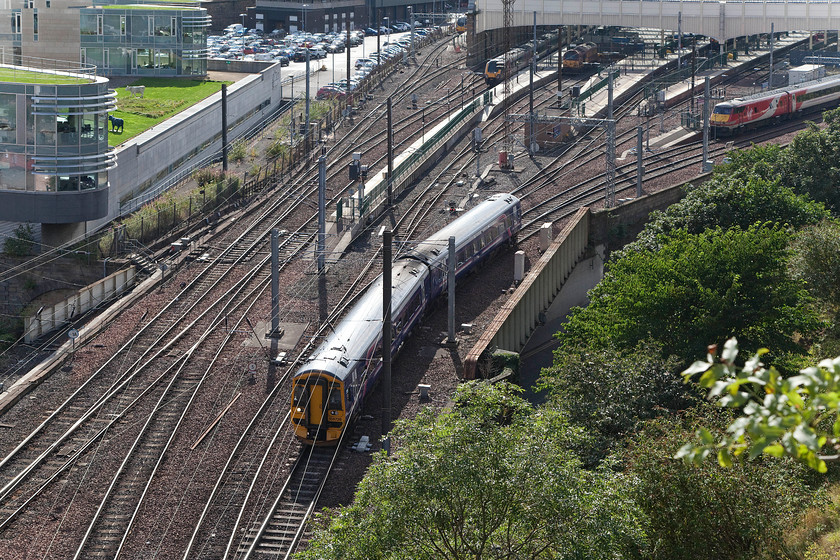 158726, SR 16.23 Edinburgh Waverley-Tweedbank (2T98), top of Jacob`s Ladder 
 As there was steam heading out along the Border's Railway the following day I thought I would try for something other than a station shot. I had spied the steps, later found out to be called Jacob's Ladder, that climb steeply up over Carlton Tunnels to the east of the station. I thought that there might be an opportunity for some interesting pictures and my hunch was correct with a great view of the throat of Waverley station below. Here, 158726 leaves working the 16.23 to Tweedbank. 
 Keywords: 158726 16.23 Edinburgh Waverley-Tweedbank 2T98 top of Jacob`s Ladder