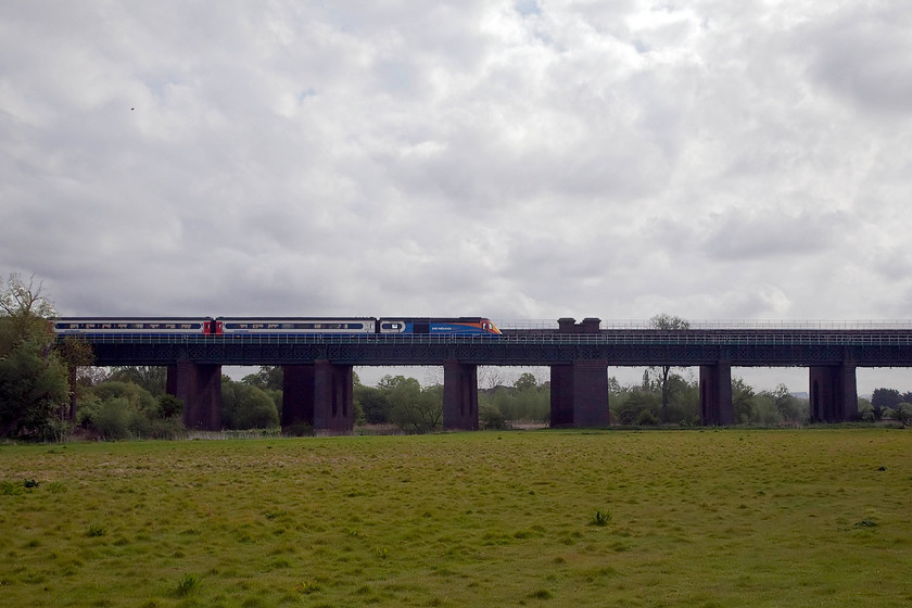 43066, EM 07.46 Sheffield-London St. Pancras (1C22, 1L), Sharnbrook TL003590 
 HST power car 43066 leads the 07.46 Sheffield to St. Pancras across Sharnbrook viaduct. 43066 was an Eastern Region unit as part of 254006 that was delivered in 1978. The combination of a view looking into the light and the early spring grass in the meadow has created a strange lighting effect. 
 Keywords: 43066 1C22 Sharnbrook TL003590