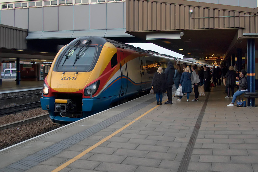 222009, EM 17.12 Nottingham-London St. Pancras (1B66, 1E), Leicester station 
 Having alighted from 222001 at Leicester station, our final train back to Wellingborough arrives at the station. 222009 works the 17.12 Nottingham to St. Pancras. My wife and son are seen waiting to board the train along with a fair few passengers on platform three. 
 Keywords: 222009 17.12 Nottingham-London St. Pancras 1B66 Leicester station